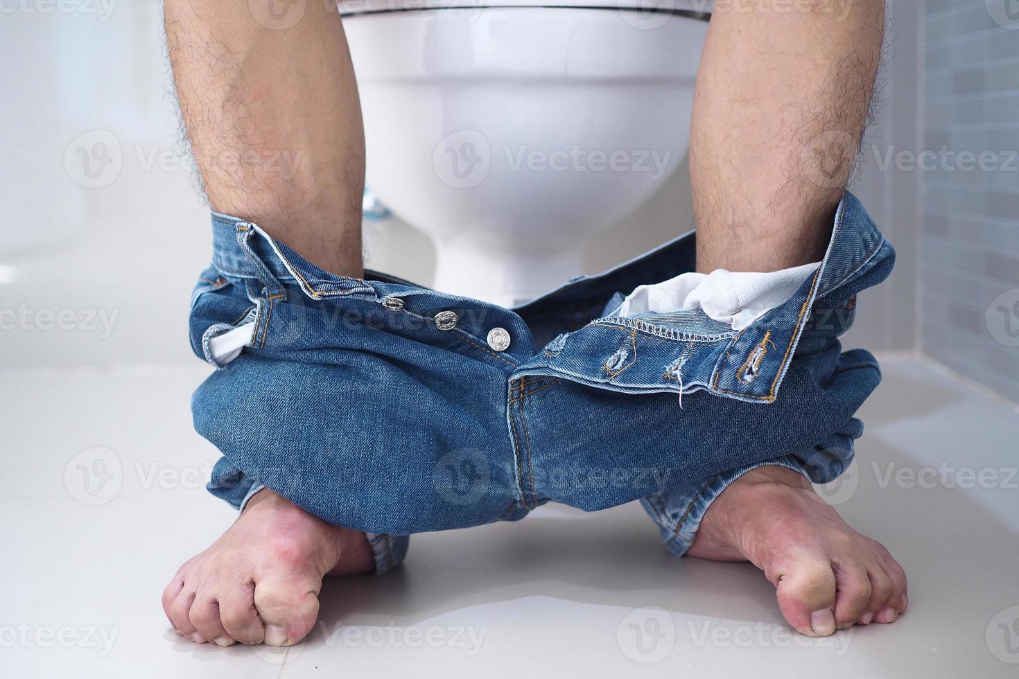 Men have abdominal pain. Want to shit. diarrhea concept photo