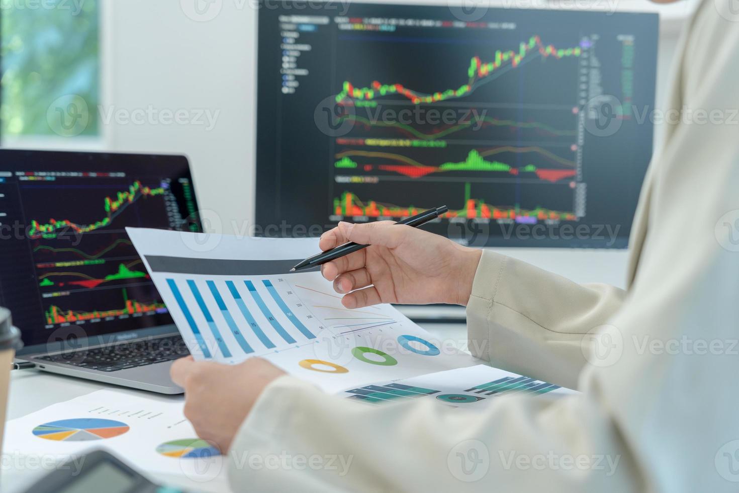 Business women calculate benefit, spreadsheets, graph financial development, bank accounts, statistics, economy, data analysis, investment analysis, stock exchange,Interest rates, income photo