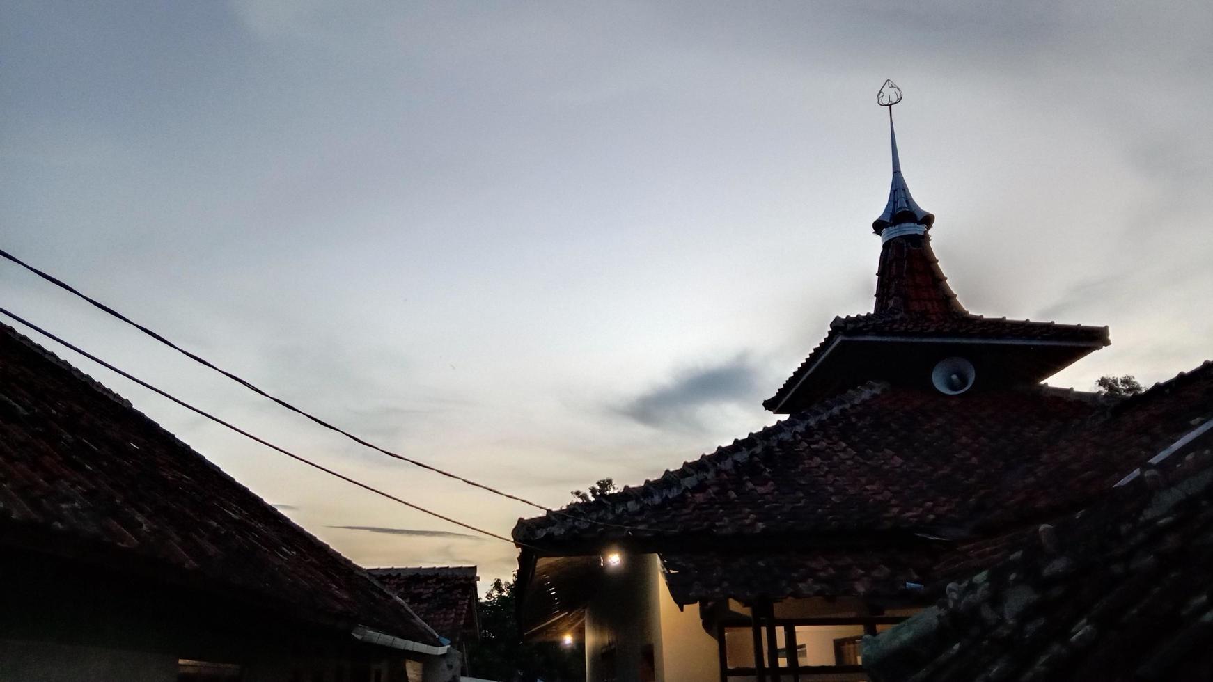 a mosque and the sky in the evening photo