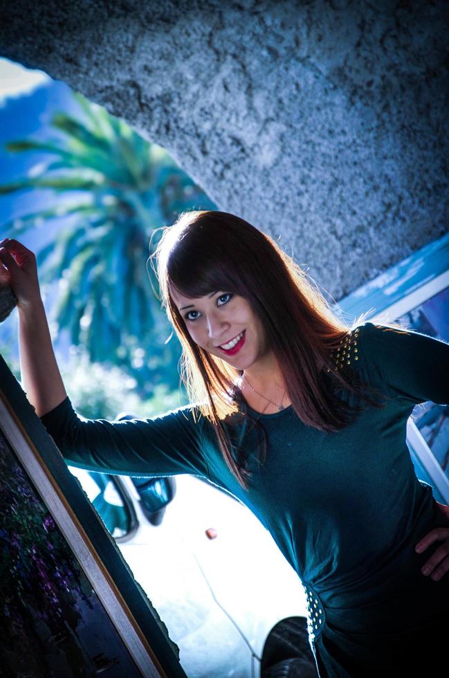 portrait of a brunette model during a photo shoot with sensual and vaguely oriental features, shots taken in the western Ligurian Riviera