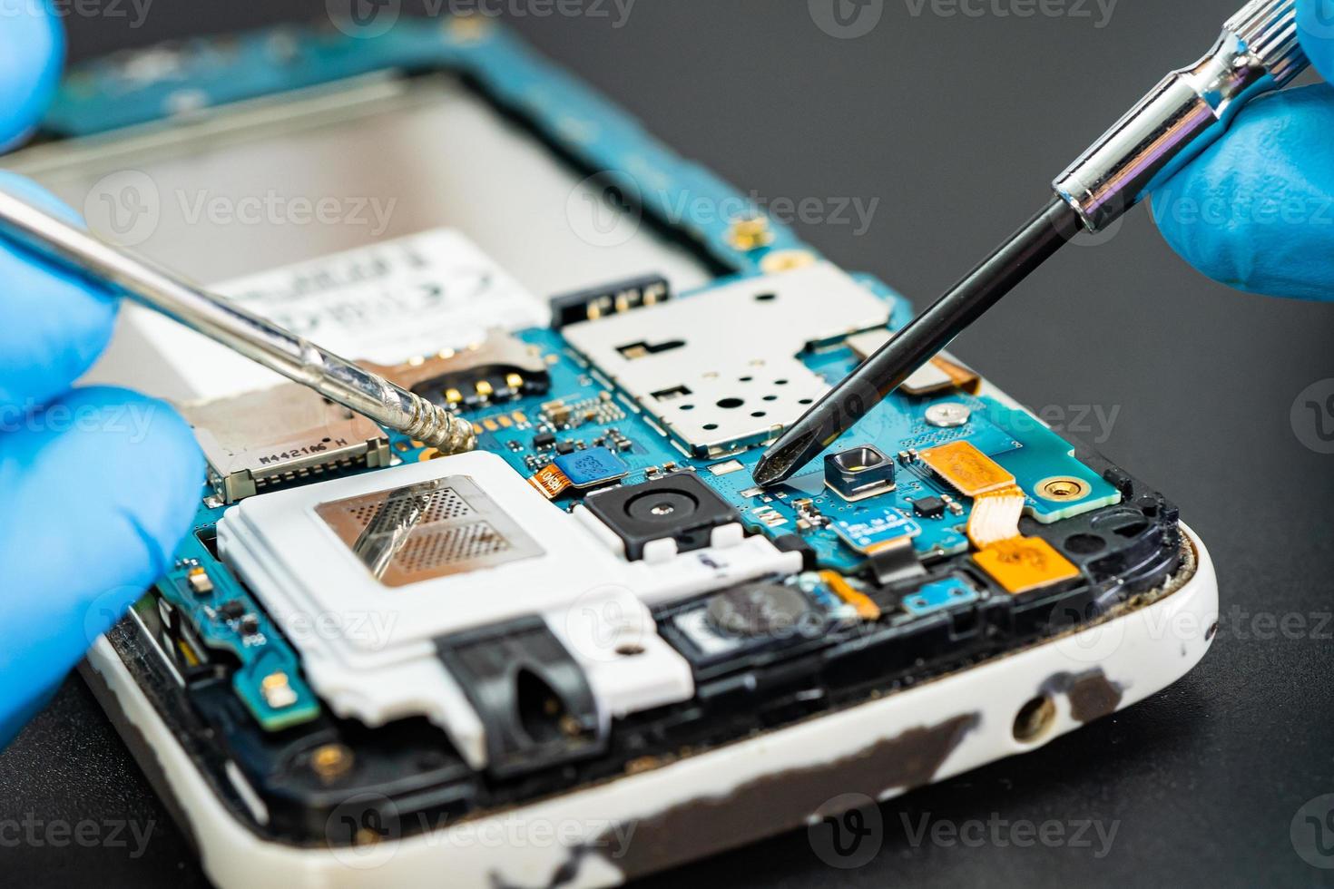 Repairing and upgrade mobile phone, electronic, computer hardware and technology concept. photo