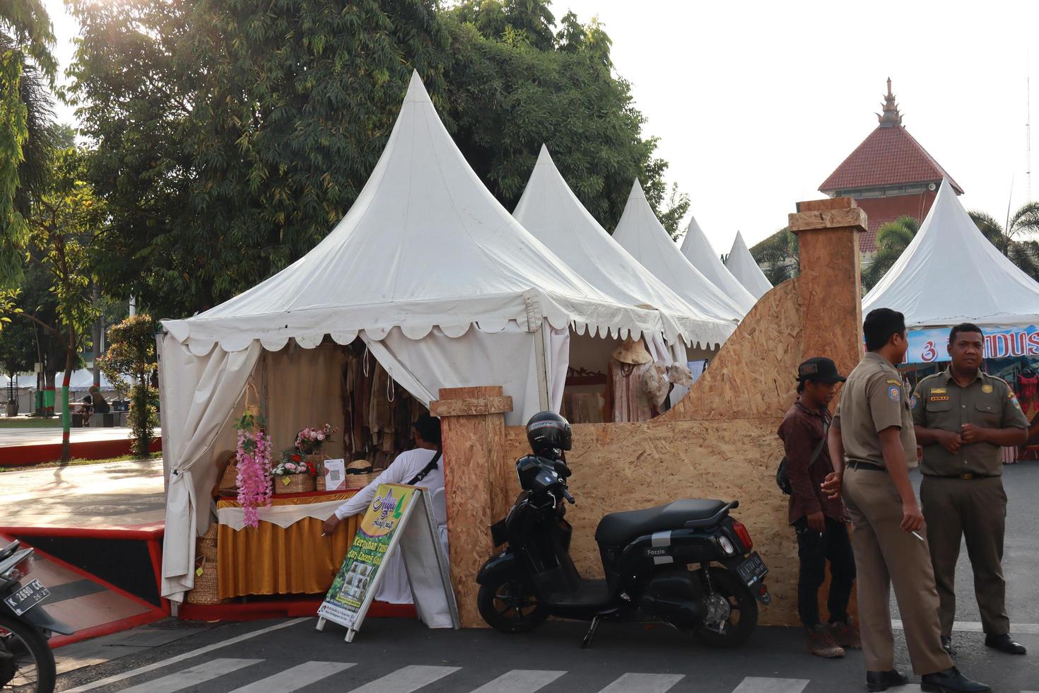 Kudus, December 2022. Photo portrait of the Kudus Expo Micro, Small and Medium Enterprises, with various kinds of clothing, food and drinks. located in the Kudus square crowded with sellers  visitors.