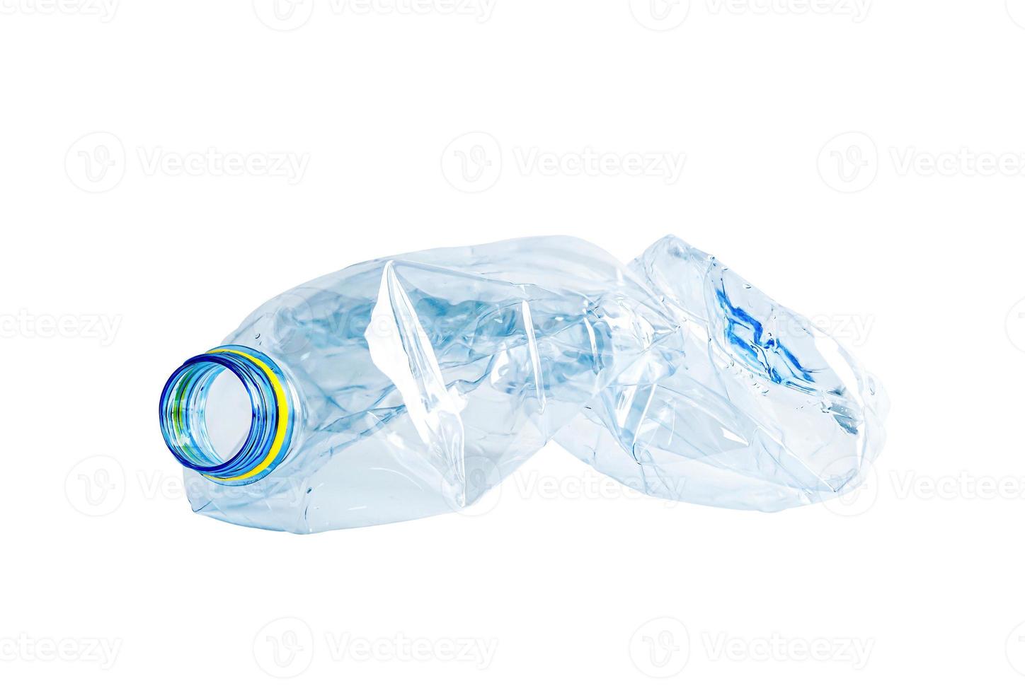 Plastic water bottle with empty crumpled used isolated on white background with clipping path, reuse, recycle, pollution, environment, ecology, global warming concept. photo