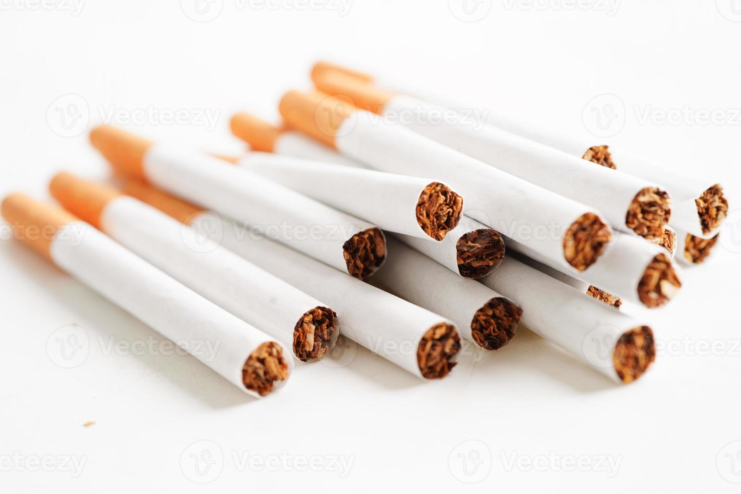 Cigarette, roll tobacco in paper with filter tube, No smoking concept. photo