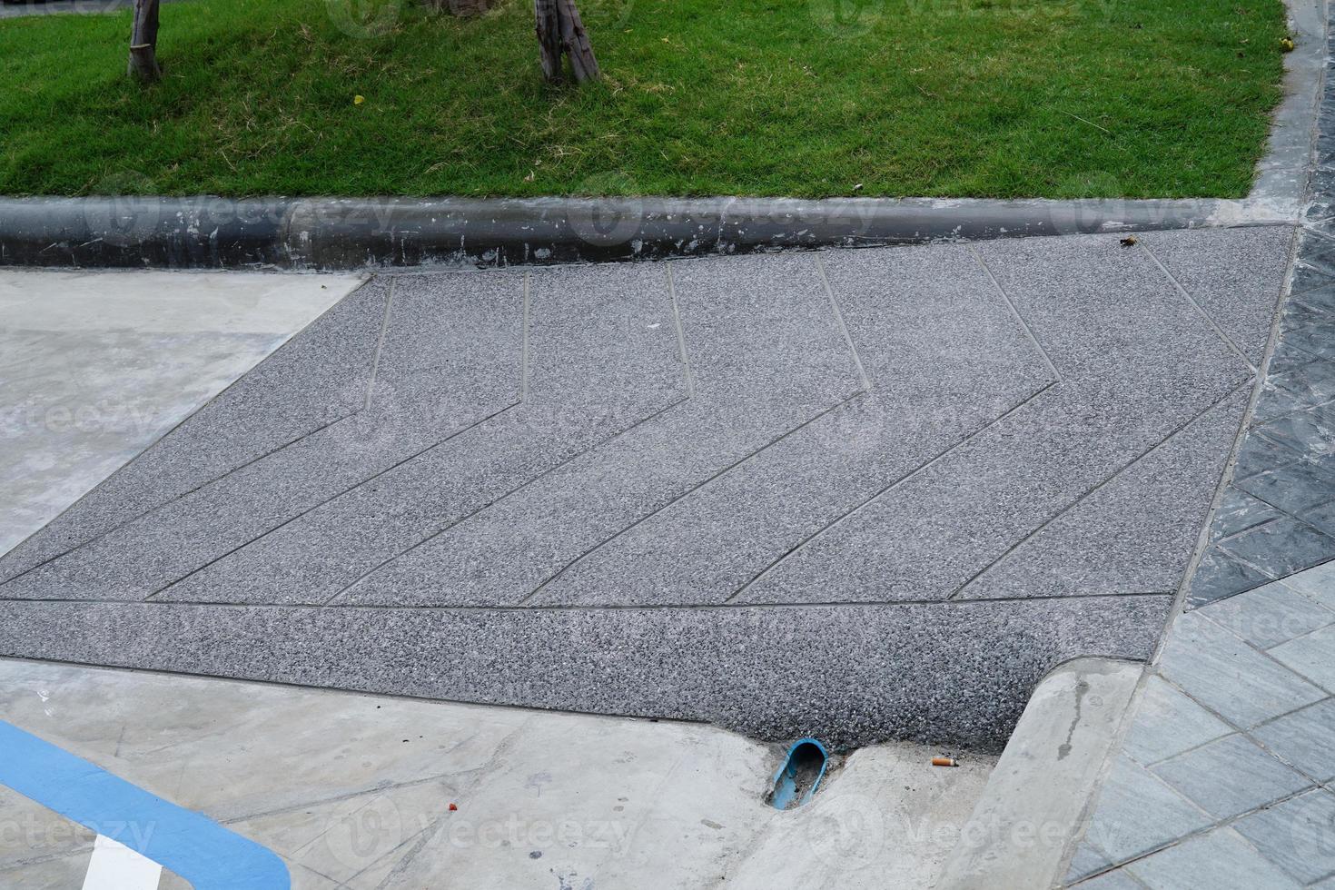 Building entrance trail with ramp for old or cannot self help disability person on wheelchair. photo