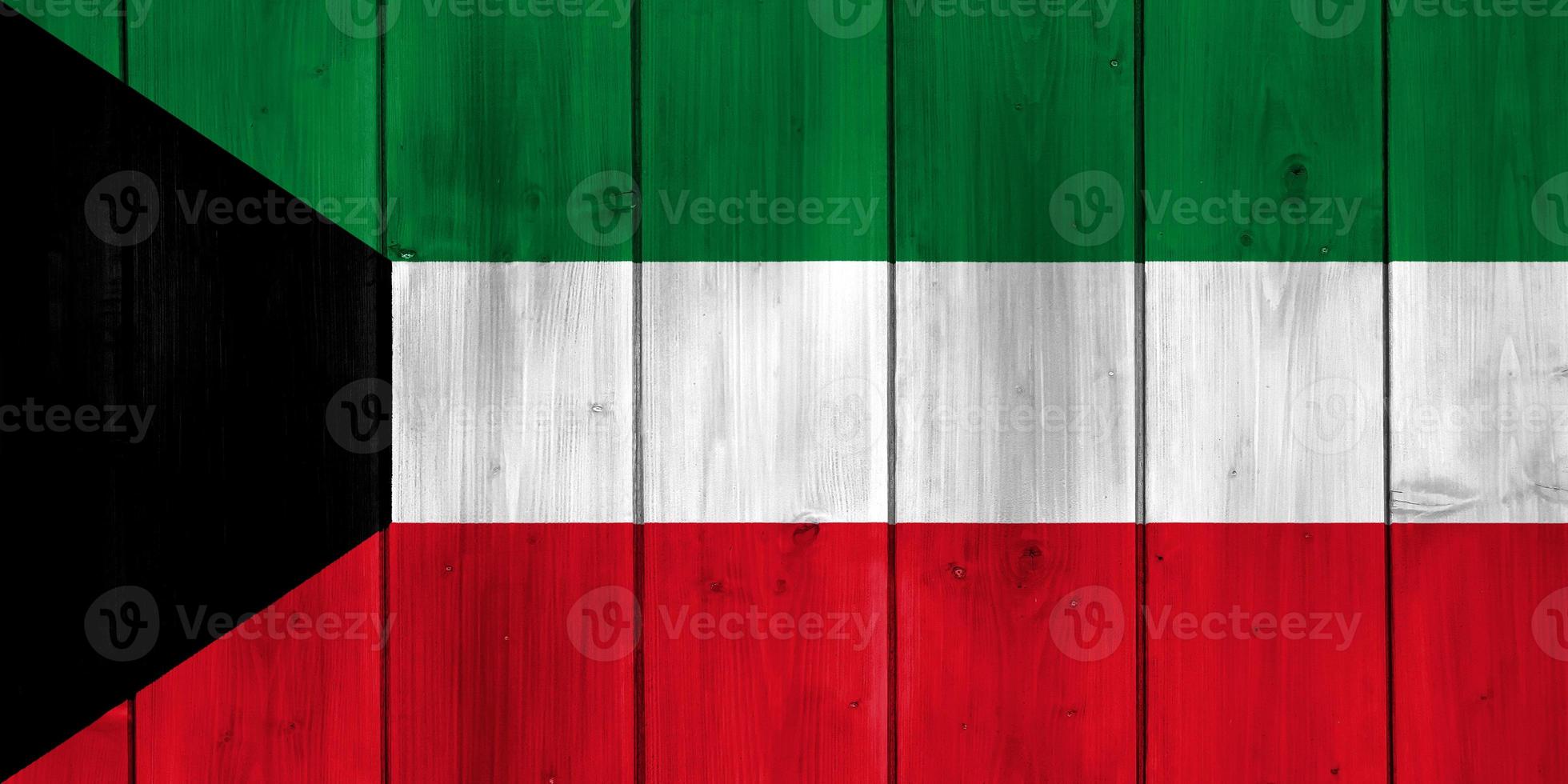 Flag of Kuwait on a textured background. Concept collage. photo