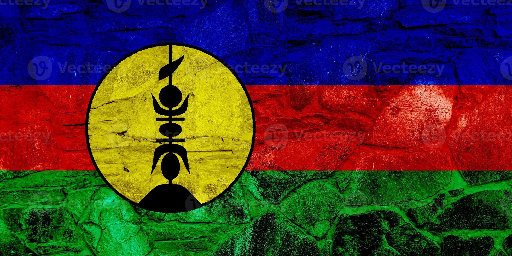 Flag of New Caledonia on a textured background. Concept collage. photo