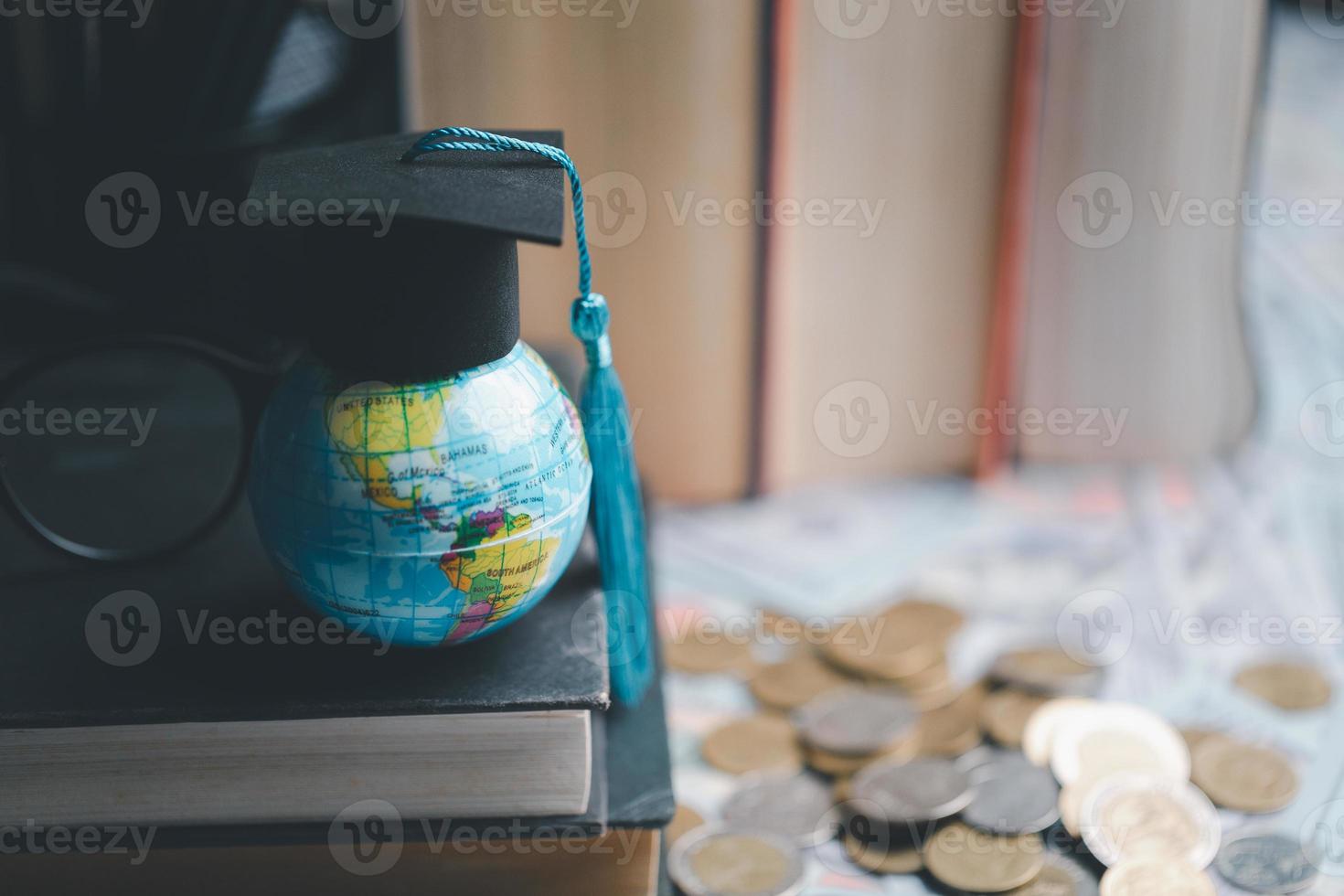 Graduation cap with Earth globe. Concept of global business study, abroad educational, Back to School. Education in Global world, Study abroad business in universities in worldwide. language study photo