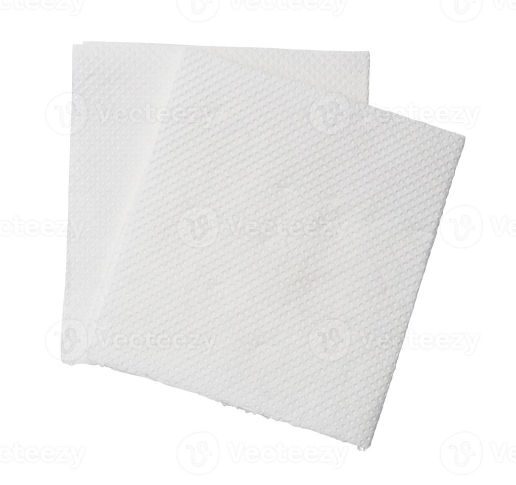 Two folded pieces of white tissue paper or napkin in stack isolated on white background with clipping path photo