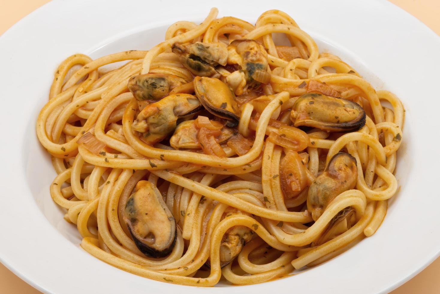 Linguine allo scoglio linguine with seafood Spaghetti allo scoglio spaghetti with seafood. Traditional Italian pasta with mussels. photo
