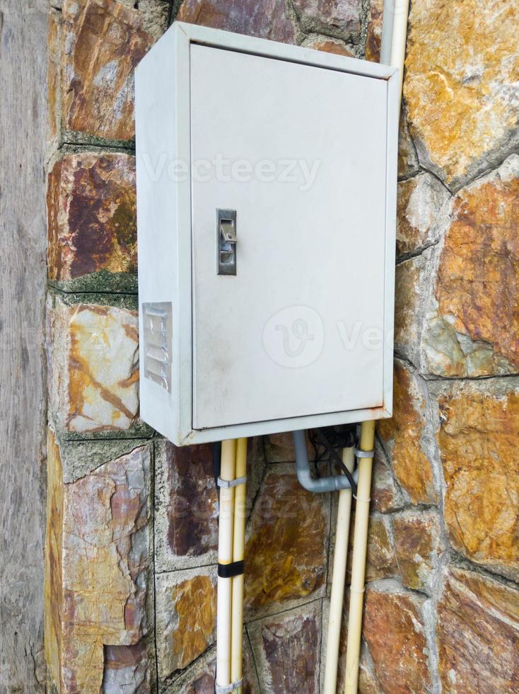 The old steel box near the wall for controlling the electric system. photo