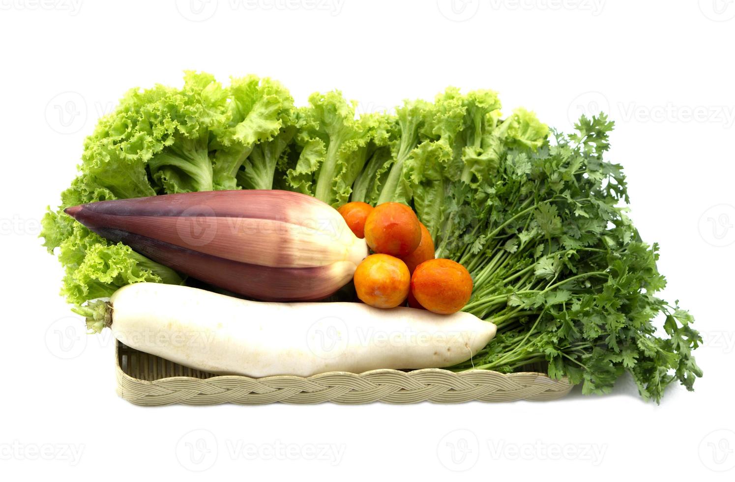 Fresh different vegetables set in basket on white background. Concept , Healthy eating food. Organic agriculture crops from garden. High vitamins and fibers. Good for the digestive system. photo