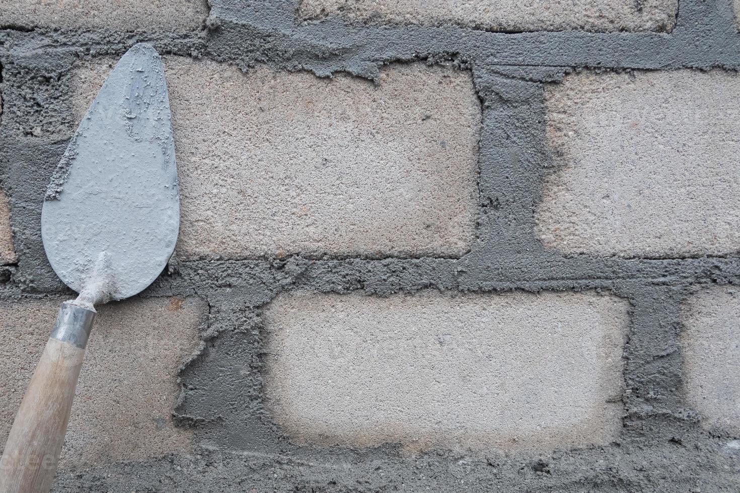 selectivamente atención en el sucio cemento cuchara porque eso es usado a Instalar en pc ladrillos, en indonesio el cemento cuchara es llamado cetok, suave atención foto
