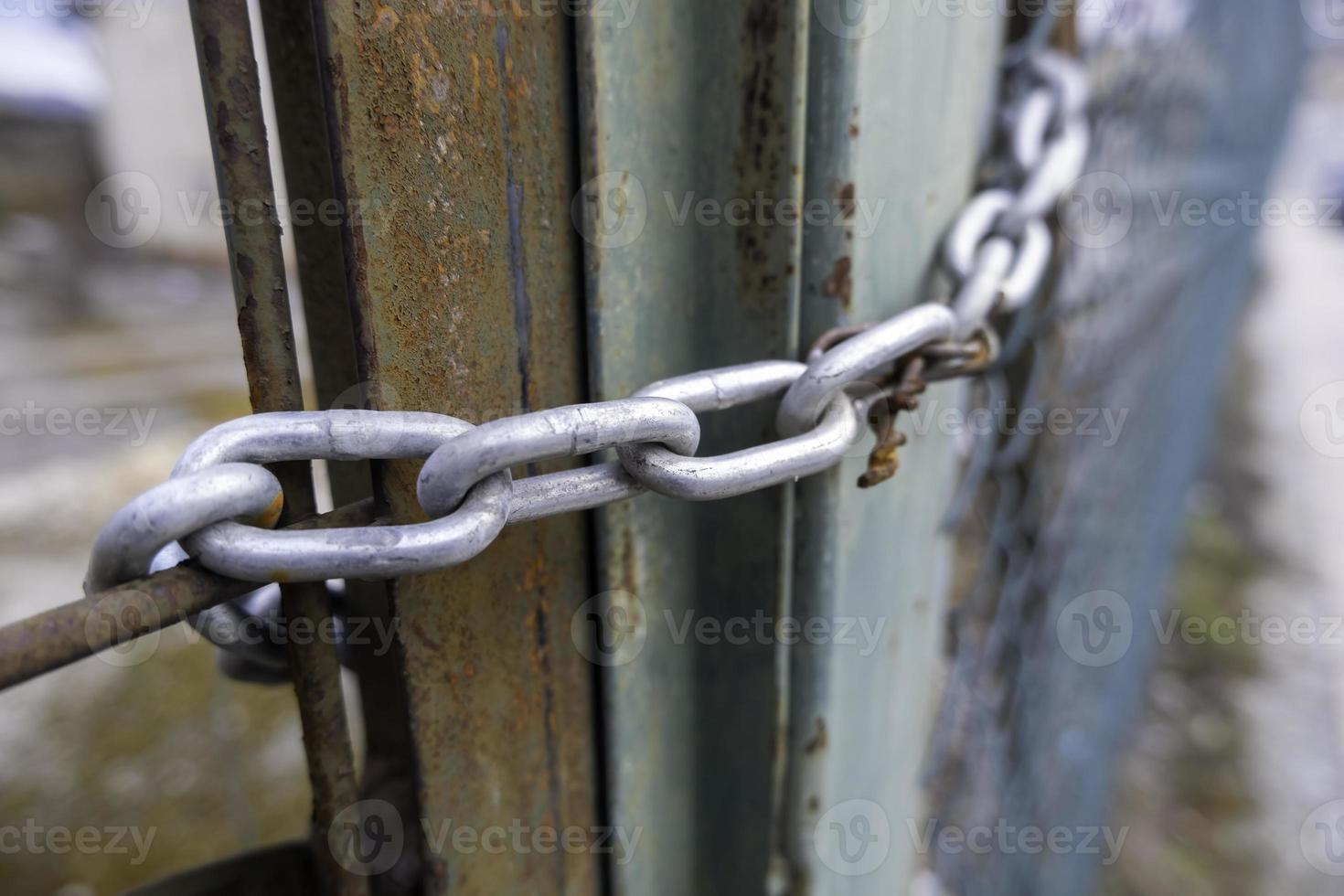 Chain closing a door 20824476 Stock Photo at Vecteezy