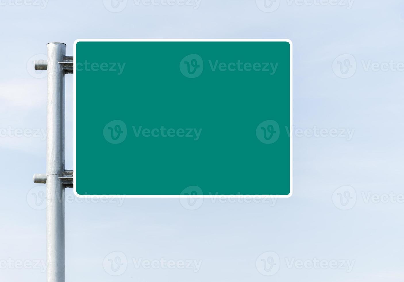 Mockup green road sign with blue sky background photo