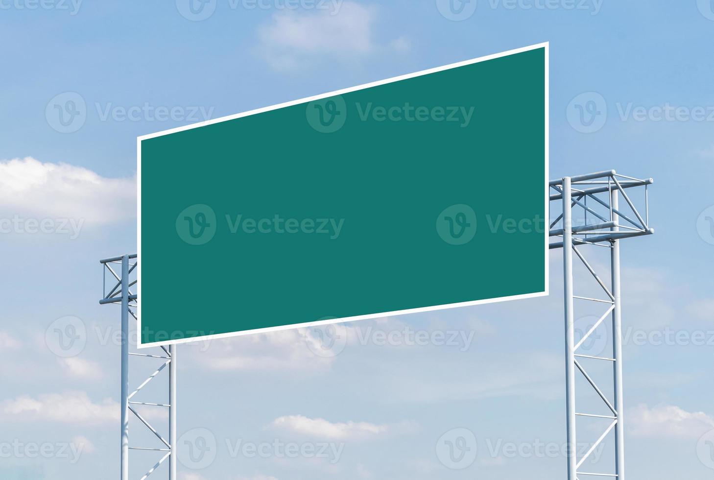 Mockup green road sign with blue sky background photo