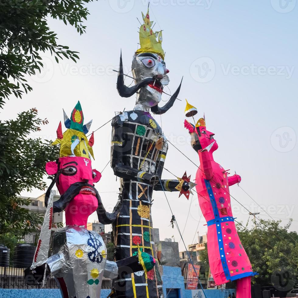 Ravnans being ignited during Dussera festival at ramleela ground in Delhi, India, Big statue of Ravana to get fire during the Fair of Dussera to celebrate the victory of truth by Lord Rama photo