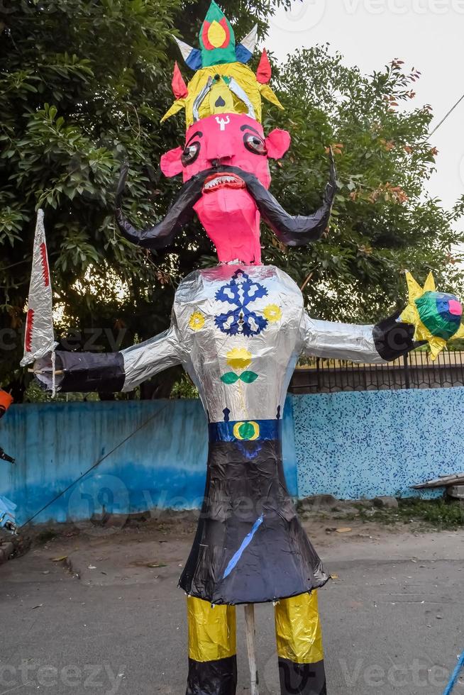 Ravnans being ignited during Dussera festival at ramleela ground in Delhi, India, Big statue of Ravana to get fire during the Fair of Dussera to celebrate the victory of truth by Lord Rama photo