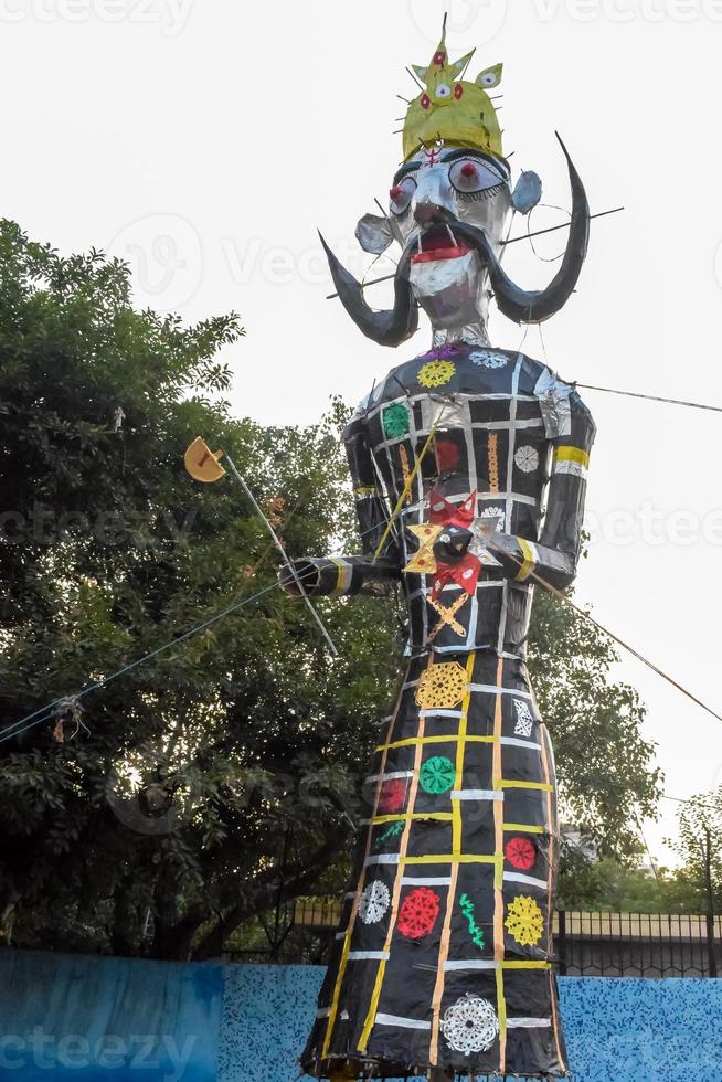Ravnans being ignited during Dussera festival at ramleela ground in Delhi, India, Big statue of Ravana to get fire during the Fair of Dussera to celebrate the victory of truth by Lord Rama photo