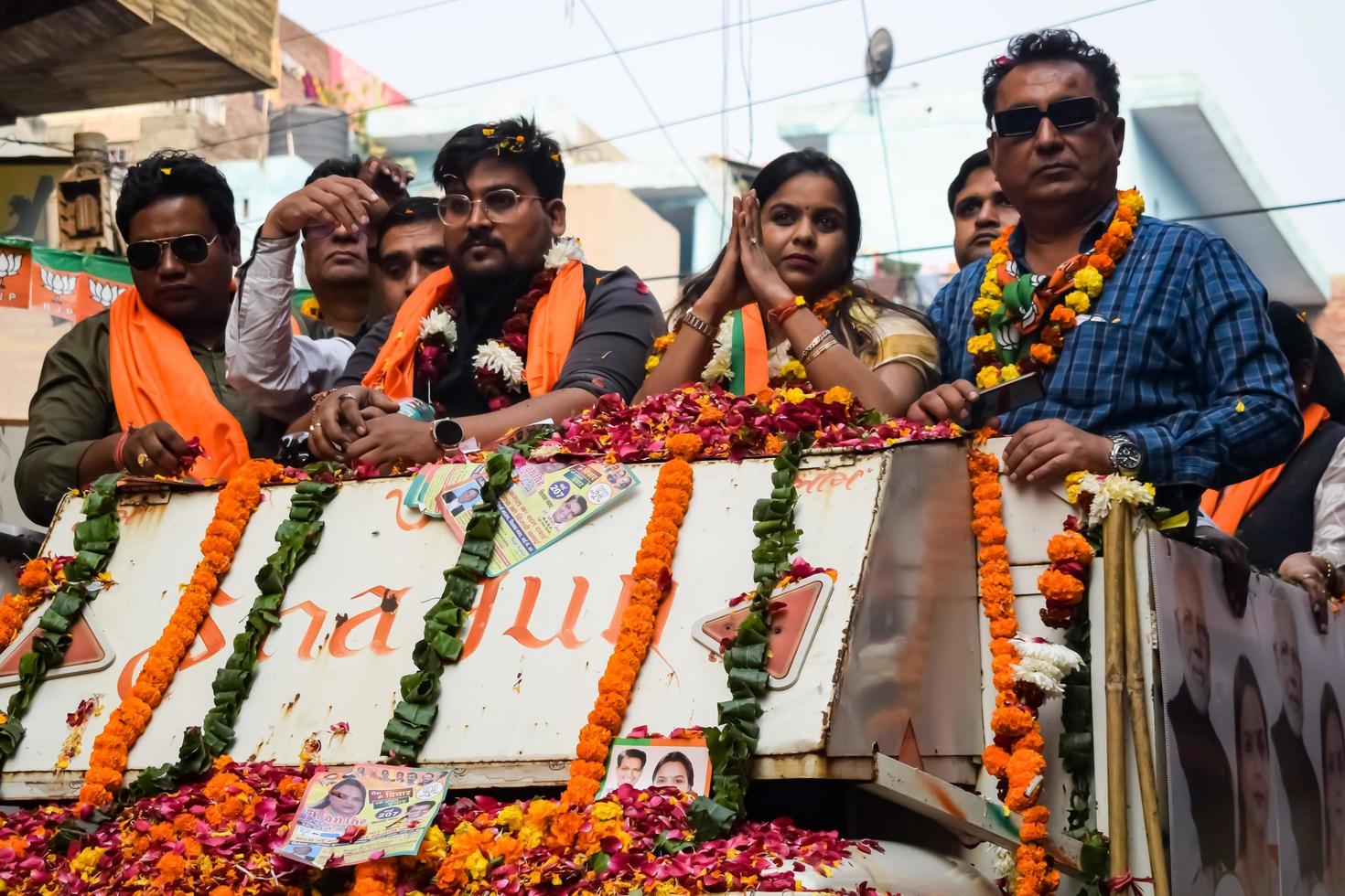Delhi, India, December 02 2022 -Bharatiya Janata Party BJP supporter during mega road show in support of BJP candidate Pankaj Luthara to file nomination papers ahead of MCD local body Elections 2022 photo