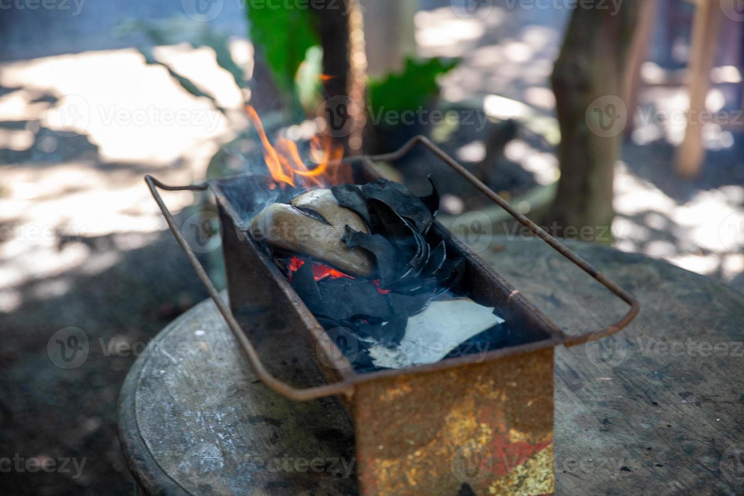 Traditional Balinese Coconut Grill 20825350 Stock Photo at Vecteezy