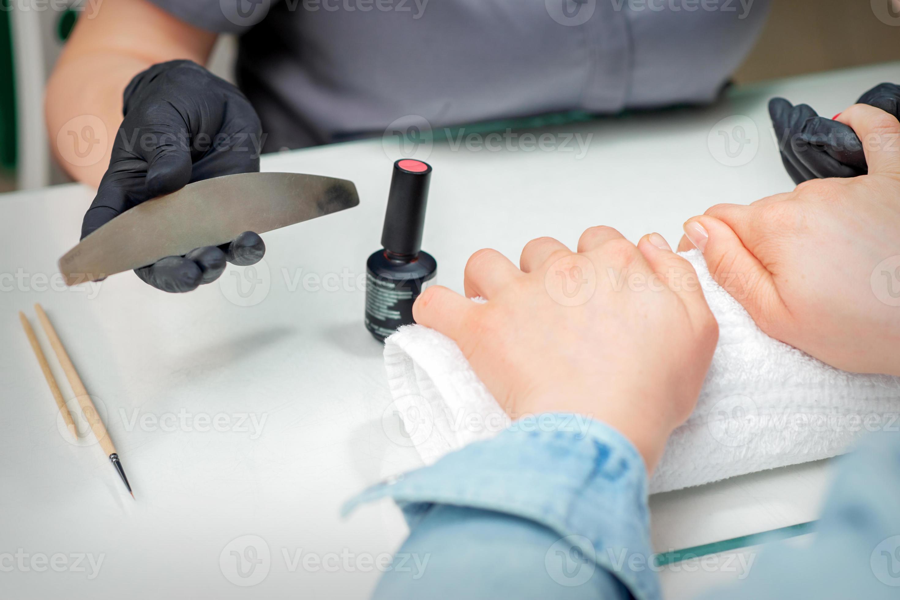 Female hands prepares to procedure by nail file 20825795 Stock Photo at