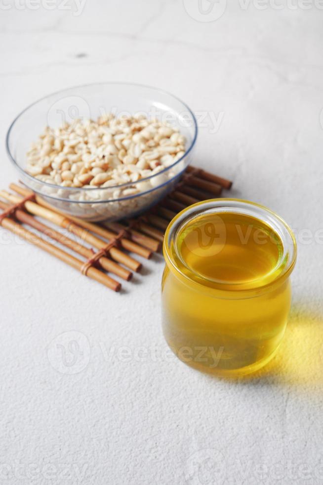 overhead shot view peanuts and oils in a container photo