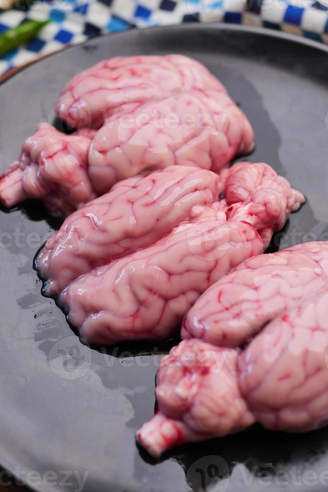 mutton brain on a chopping board photo