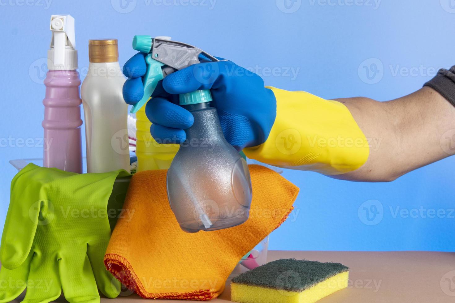 basket with cleaning products for home hygiene use photo