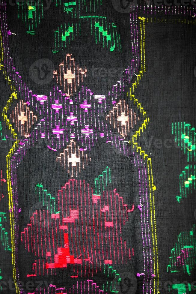 Part of a vintage ethnic Slavic bedspread with a geometric pattern. Self-woven fabric. photo