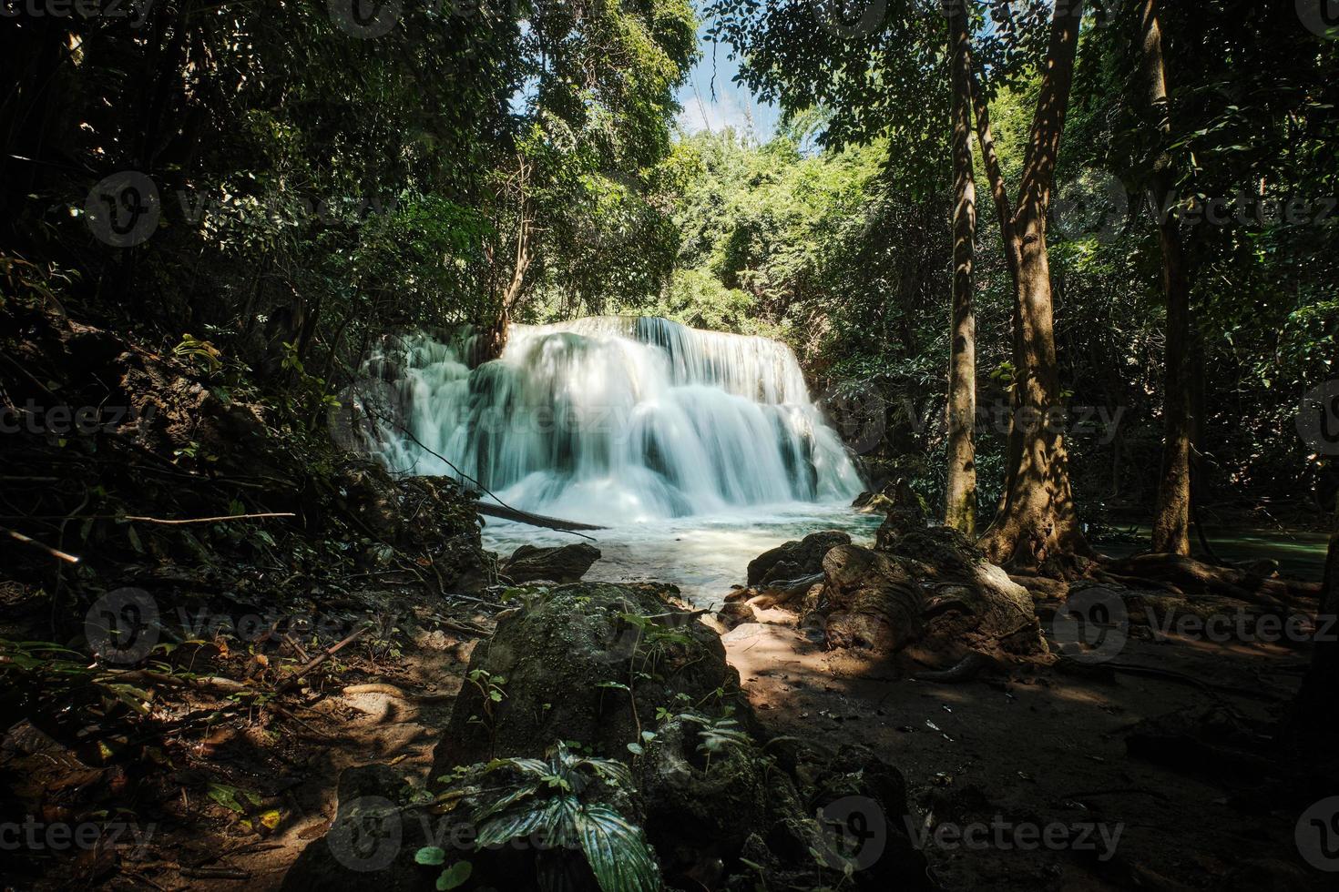 The beautiful waterfall in deep forest photo