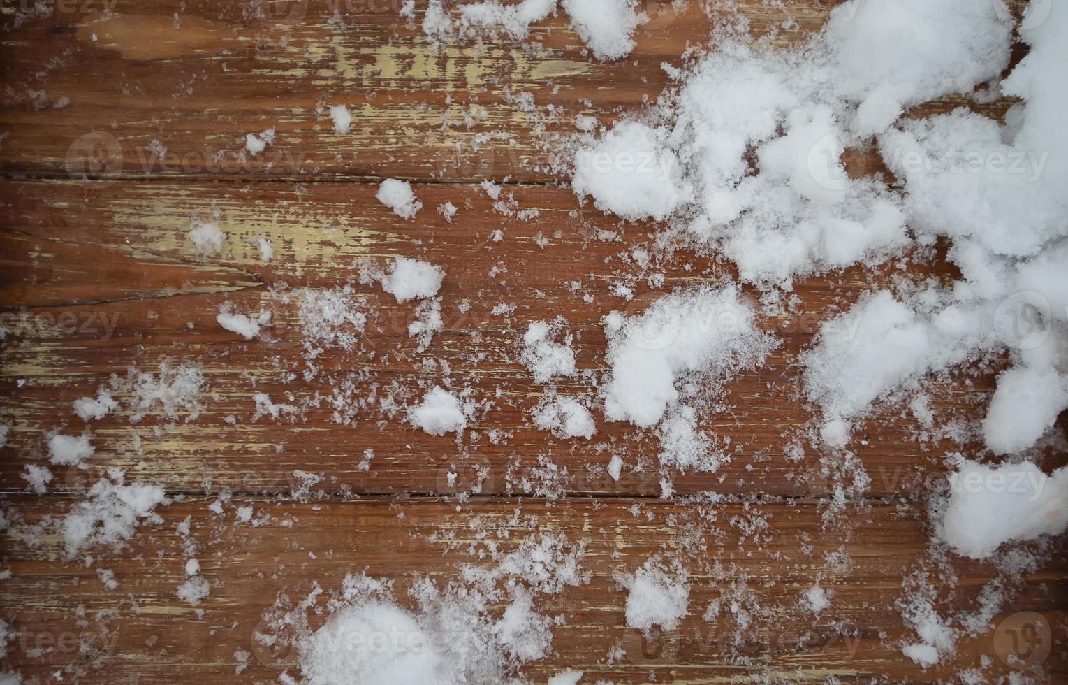 The texture of an old tree with a snowy Christmas background. photo