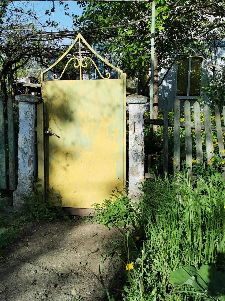 Gateway to an old village house photo