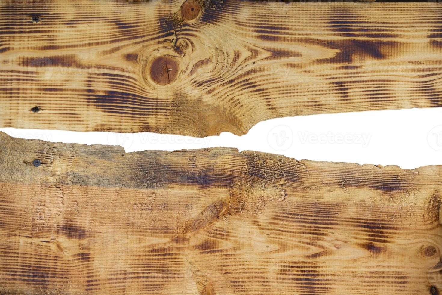 Background of rough wooden planks of curves with white slots. photo