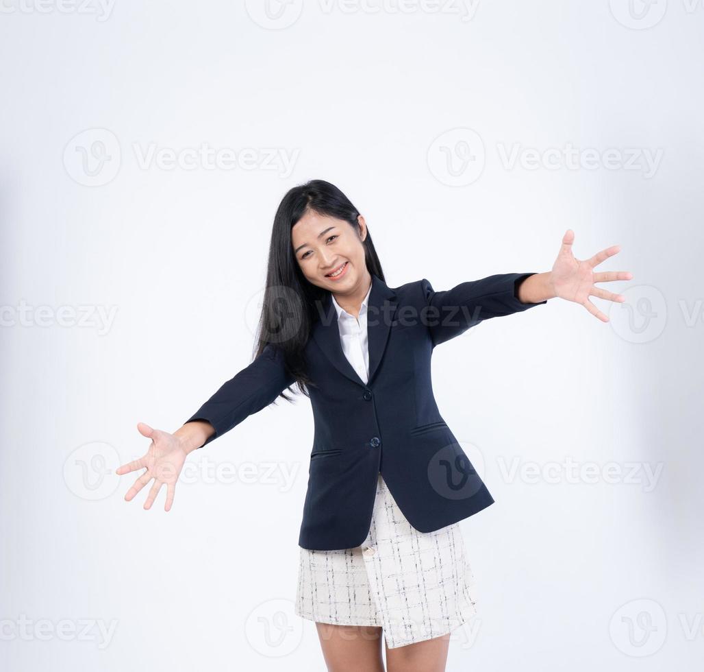 Portrait of a happy young Hug business woman isolated on a white background photo