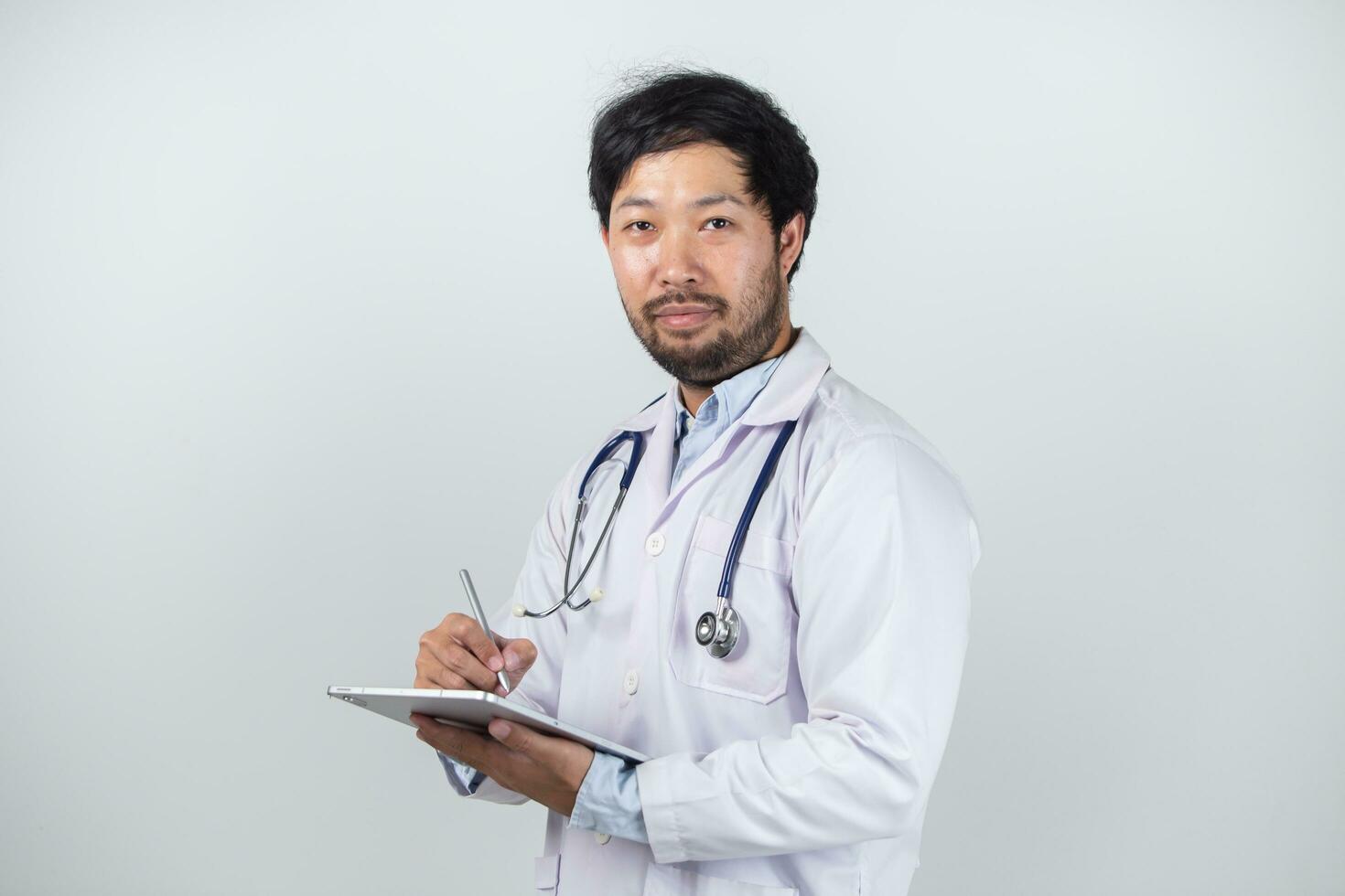 Medicine doctor with stethoscope touching medical icon network connection and modern interface on digital tablet on hospital background. Medical technology network concept photo