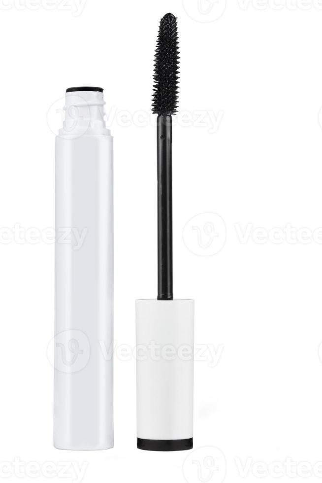Closeup mascara bottle and brush. Black mascara and tube isolated on white background. photo