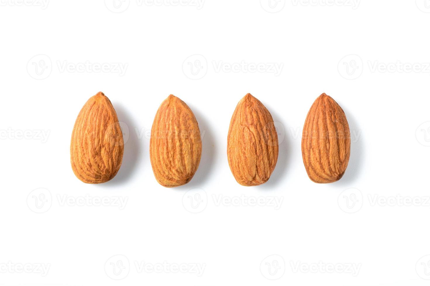 Almonds nut isolated on white background. They are highly nutritious and rich in healthy fats photo