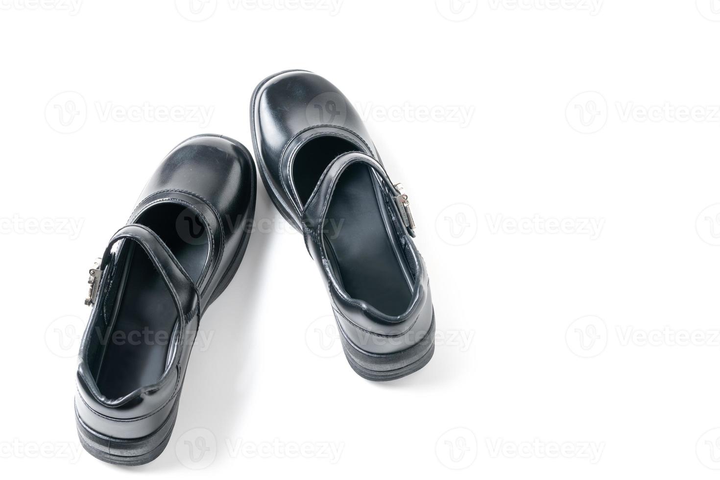 top view of Black girl student shoes isolated on white background, photo