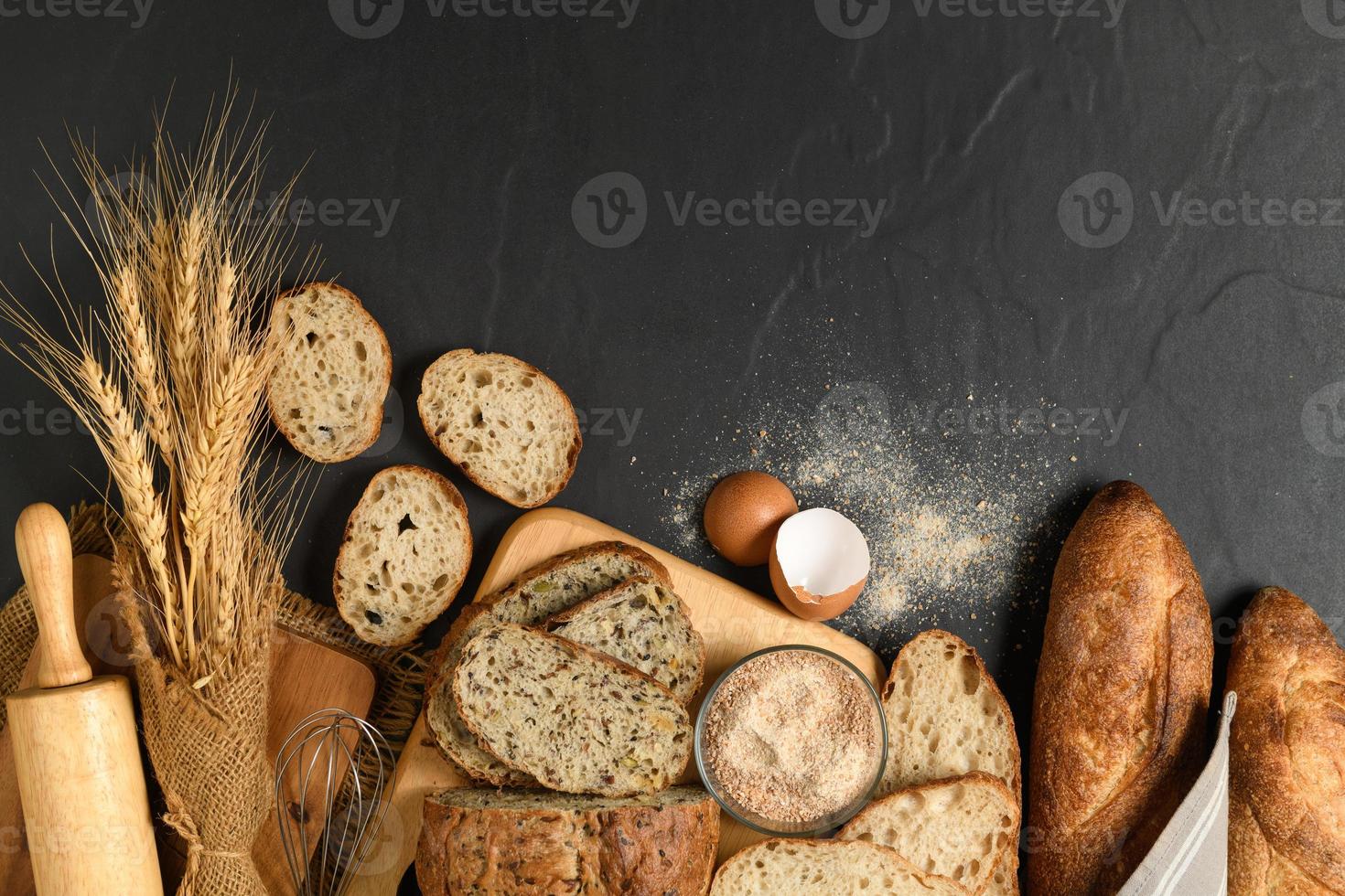 slide multi grain sourdough bread and sliced Baguette with Whole Wheat Flour photo