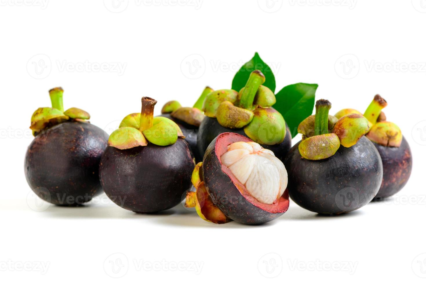 Fresh Mangosteen with leaves isolated on white background. Queen of Fruits. photo