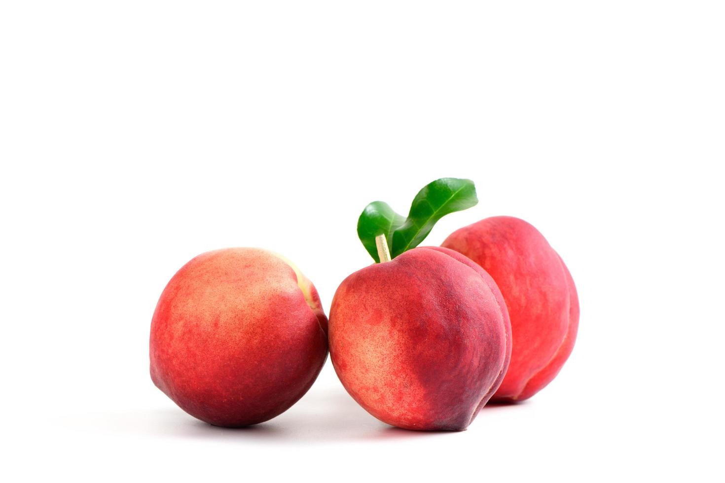 Fresh  peaches  isolated on white background. photo