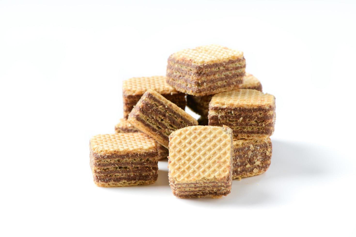 square chocolate wafer biscuits isolated on white background, bakery and snack photo