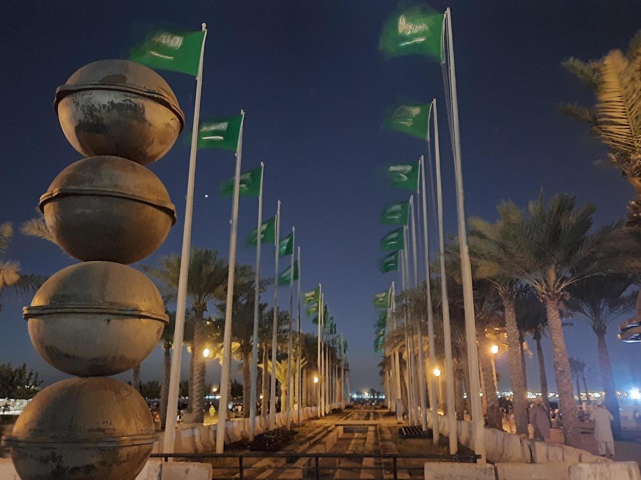 Jeddah, Saudi Arabia, Feb 2023 - A beautiful view of the flags of Saudi Arabia on the Jeddah Corniche on the occasion of the Foundation Day of Saudi Arabia. photo