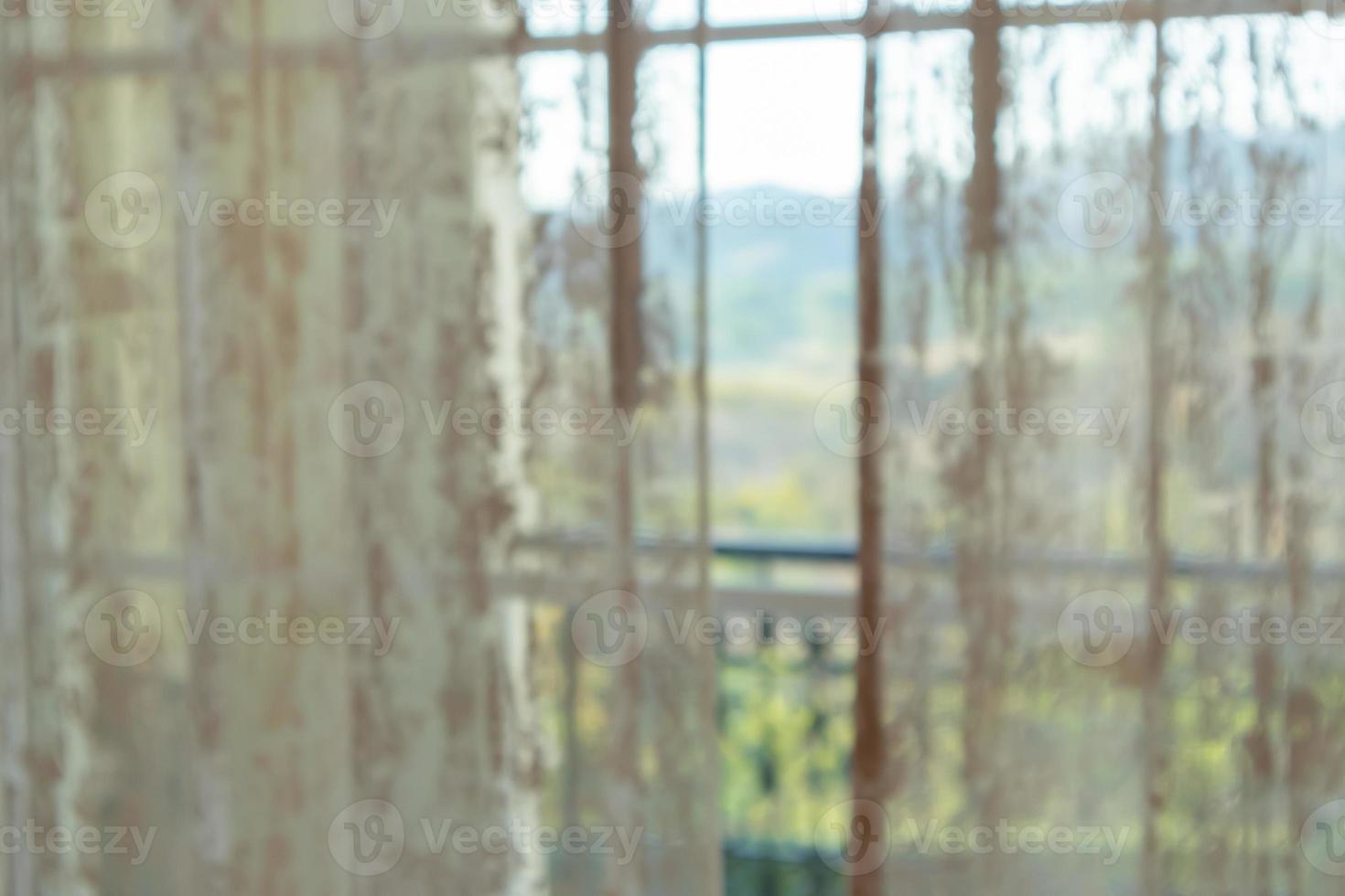 Abstract blur curtain window with green garden background photo
