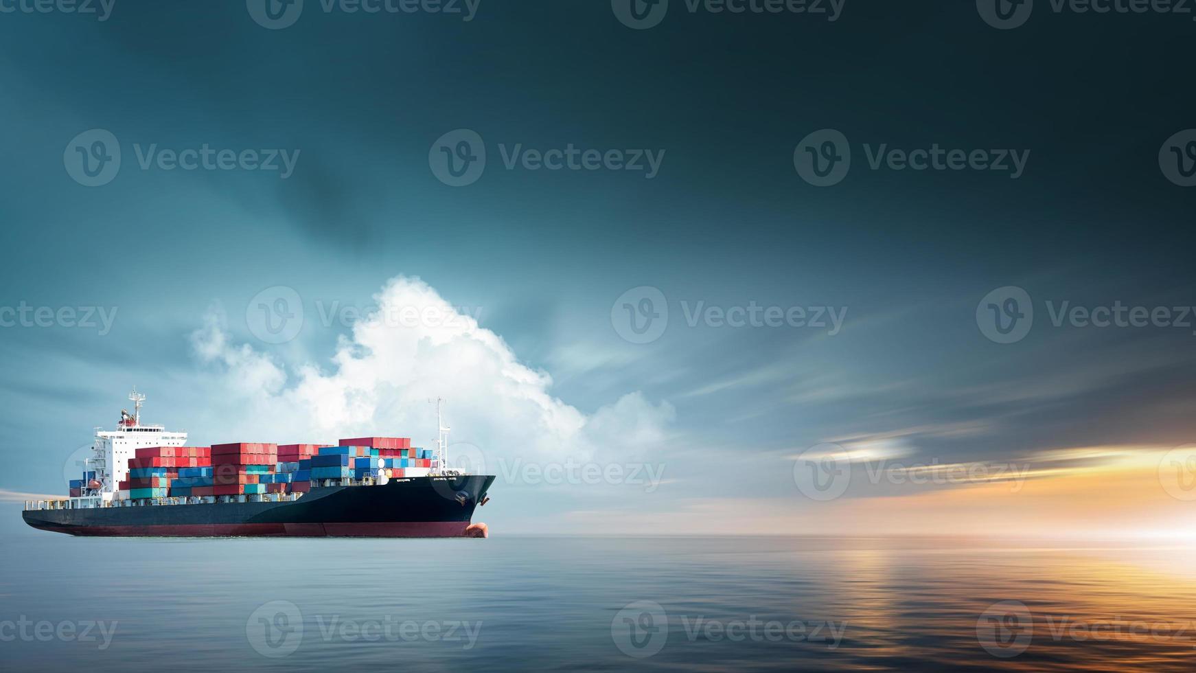 Container cargo ship in ocean at sunset dramatic sky background with copy space, Nautical vessel and sea freight shipping, International global business logistics transportation import export concept photo