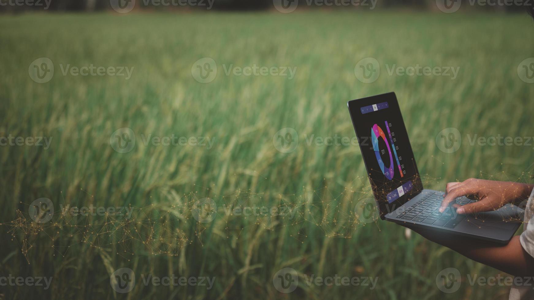 intelligence farmer and technology concept, woman hand holding computer