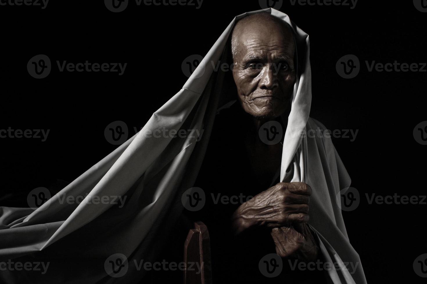 old man with blanket photo