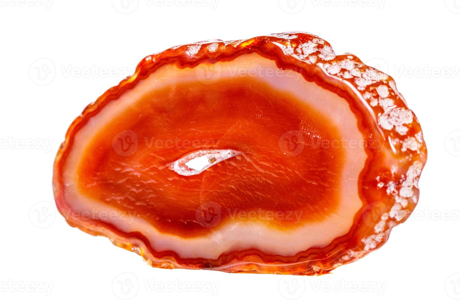 Macro mineral orange agate in crystals on white background photo