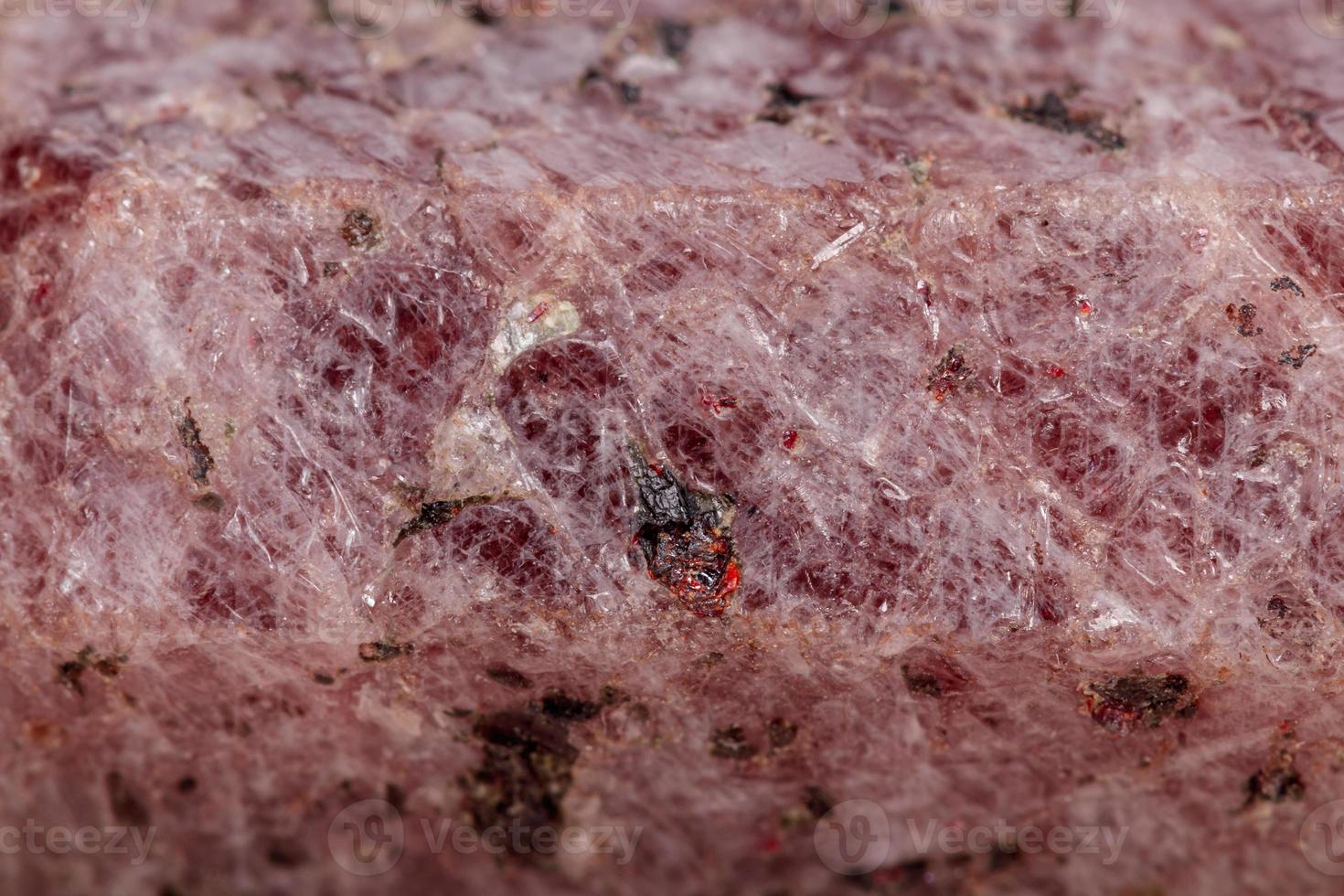 Macro mineral stone Ruby in the breed a white background photo